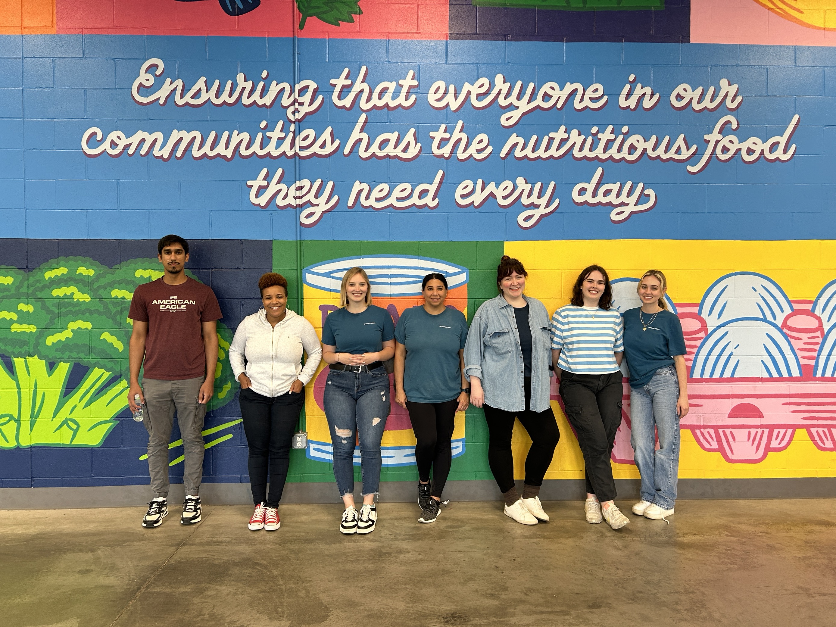 Dwellworks - Global Mobility and Destination Services - Food bank volunteers in USA